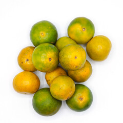 pile of organic tangerine on white background.