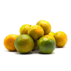 pile of organic tangerine on white background.