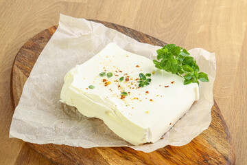 Greek Feta cheese over board