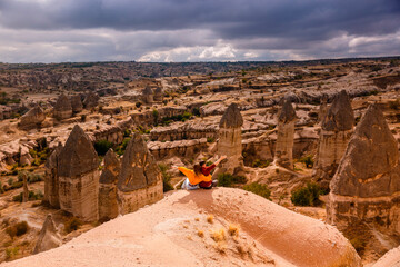Young couple on hill in Cappadocia 1