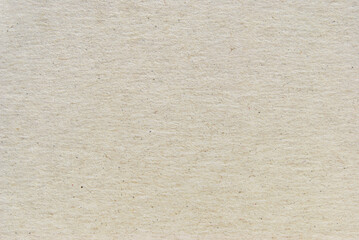 A sheet of brown recycled craft paper texture as background