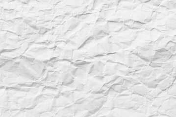 A sheet of white recycled wrinkled cardboard, white wrinkled paper texture as background