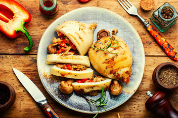 Tasty grilled squid with mushrooms filling