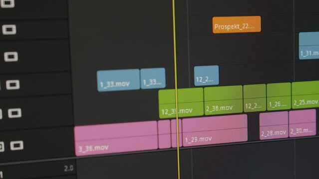 Close-up video editing on a computer, timeline. Professional photo and video editing software. Video processing, postproduction, clip maker. 