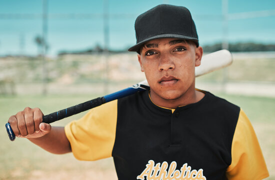 Ill show you how to win a game. Shot of a young baseball player holding a baseball bat while posing outside on the pitch.
