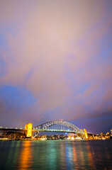 Naklejka na ściany i meble Photo of Sydney Harbour Bridge at Night, just after Sunset, Sydney, Australia