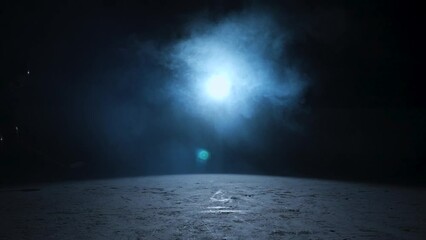 Dark silhouettes of two male hockey players in a uniform, helmet and with stick in his hands, skating on ice. An athletes posing on the ice of dark arena with blue backlight and smoke. Slow motion. - Powered by Adobe