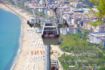 Turkey. Alanya. 09.16.21. A couple in love in a cabin on a cable car.