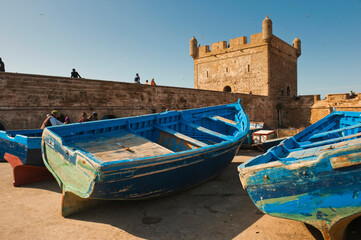 Fototapeta na wymiar Blue fishing boats in Essaouira harbour, formerly Mogador, Morocco, North Africa, Africa