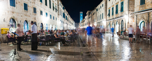 Panoramic photo of the Franciscan Monastery in Dubrovnik Old Town at night, Croatia - obrazy, fototapety, plakaty