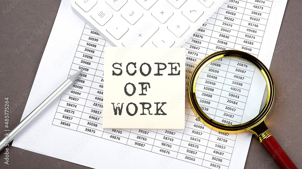 Poster scope of work text on sticker on the chart ,with calculator and magnifier