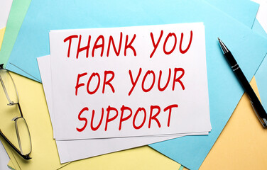 THANK YOU FOR YOUR SUPPORT text on paper on colorful paper background