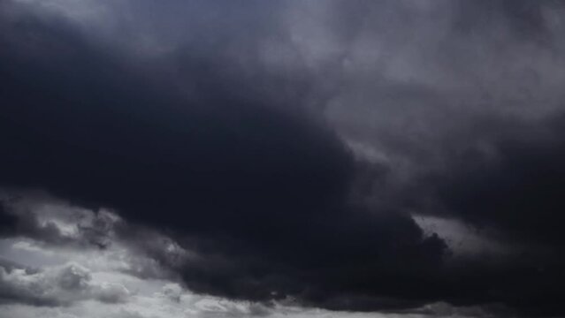 timelapse of dark clouds in the sky when the weather changes