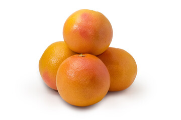 Ripe red grapefruits on a white background