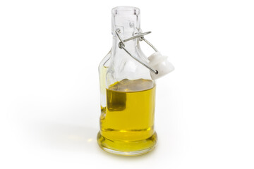 Small bottle of olive oil on a white background
