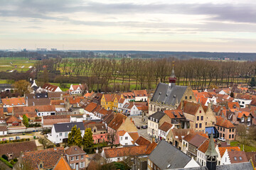 Fototapeta na wymiar Aerial view of Damme town as seen from the top of Onze-Lieve-Vrouwekerk (Church of Our Lady) tower, Belgium 