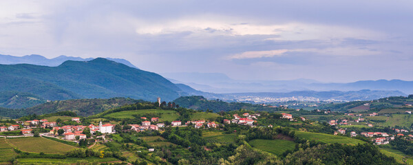 Vineyards and  the hill top town of Kojsko, Goriska Brda (Gorizia Hills), in Brda, the wine region of Slovenia, Europe