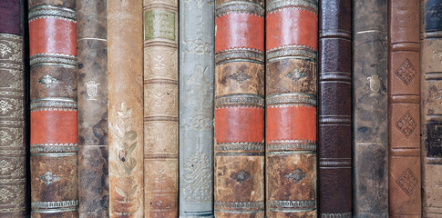 Panorama image of old rustic and vintage books. Removed text.