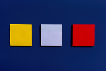 Colorful sticky notes on color background. Copy space for your text message. Sticky notes background