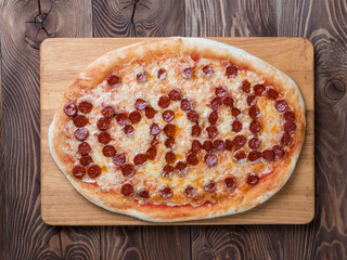 Father's day background. Pepperoni pizza with i love dad lettering on wooden tabletop. Father day...