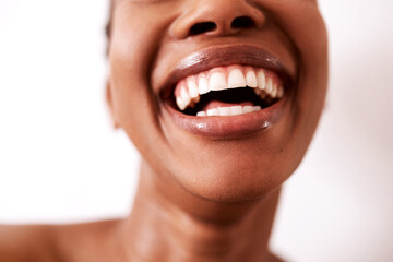 We could all do with a good laugh. Studio shot of an unrecognizable woman laughing against a white background.