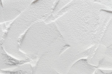 Artistic background, texture of sand and plaster. Color white