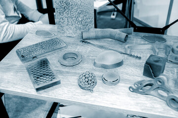 Gray abstract models printed on 3d printer from powder close-up. 3D prototype created by 3d...