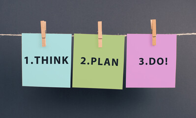 The words think plan do are standing on a piece of paper, having a business and education goal,...