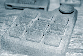 Different objects printed on industrial powder 3D printer. Multi Jet Fusion MJF 3D printing. Object...