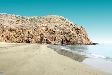  tongues of lava eroded by the sea, the auto clastic gaps or pyroclastic andesite, The petrified wave, beach of Mónsul, Natural Park, Cabo de Gata, spain
