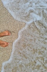 feet on the beach feeling good in Bali
