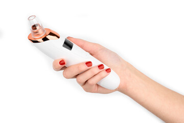 Cosmetic procedure at home, woman cleaning face with vacuum blackhead remover. Blackhead remover...