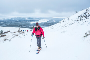 Fototapeta na wymiar Ski touring at CairnGorm Mountain Ski Resort, Aviemore, Cairngorms National Park, Scotland, United Kingdom, Europe