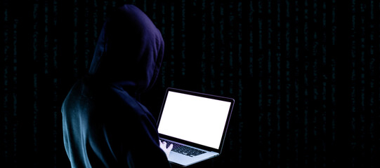 Hacker attack cyber security. Digital laptop in hacker man hand isolated on black. Internet web...