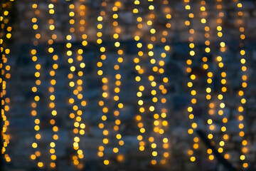 Yellow abstract bokeh made from Christmas lights on black isolated background. Holiday concept, blur bokeh, overlay for your images. - 485805084