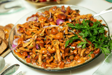 Plate with tasty cooked mushrooms