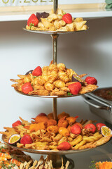 various seafood in breadcrumbs on a tray