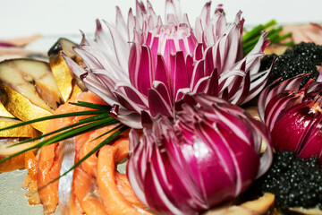beautifully chopped blue flower-shaped onion on a tray