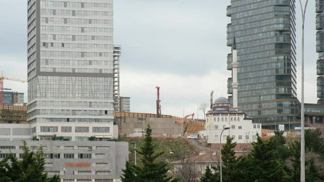 Construction machines are working at the Fikirtepe urban regeneration zone in Istanbul, Kadikoy, Turkey in 2022.