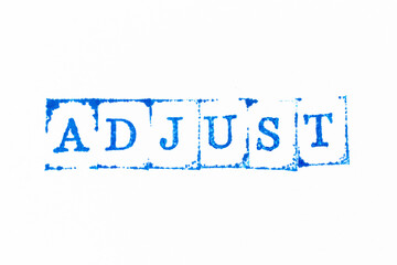 Blue color ink rubber stamp in word adjust on white paper background