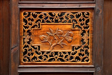 Wood carving patterns on doors and Windows of traditional Chinese classical buildings