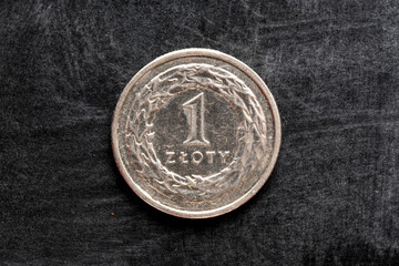Coin 1 zloty. Currency Poland.Coin on a black background.
