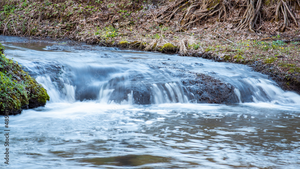 Canvas Prints Wide photo of small waterfall shot with long exposure. Little waterfall on the river