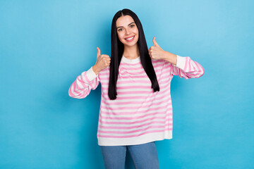 Photo of youth lovely lady show fingers thumbs-up ideal select quality isolated over blue color...