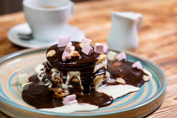 Pancake chocolate cake with nuts. High quality photo