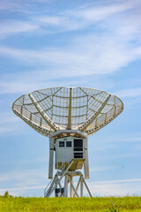 Ionospheric observatory with a giant satellite dish for receiving a satellite signal.