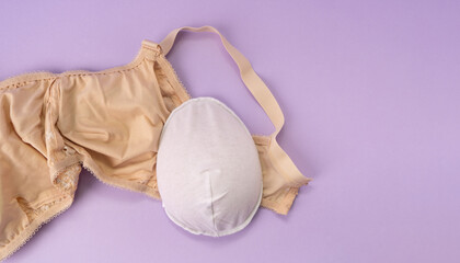 Breast prosthesis before inserting it into the special bra. Breast prosthesis and post surgery bra...