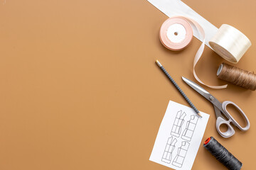 Sewing and knitting accessories in workshop. Fashion designer or seamstress workplace