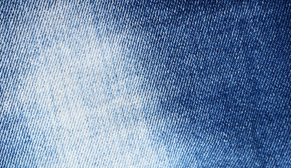 Blue jeans texture. Vintage jeans fabric for background.