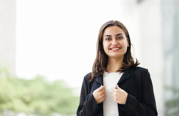 portrait young confident business woman smiling happily